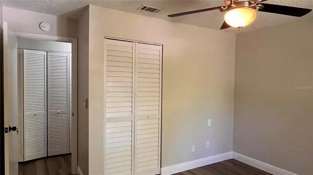 a bathroom with a shower and a mirror