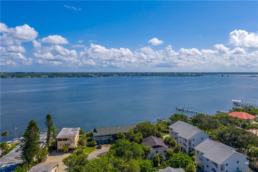5041 North Beach Road, Unit 3B Englewood, FL 34223 - Photo 49 of 55 a sunset view with lake view