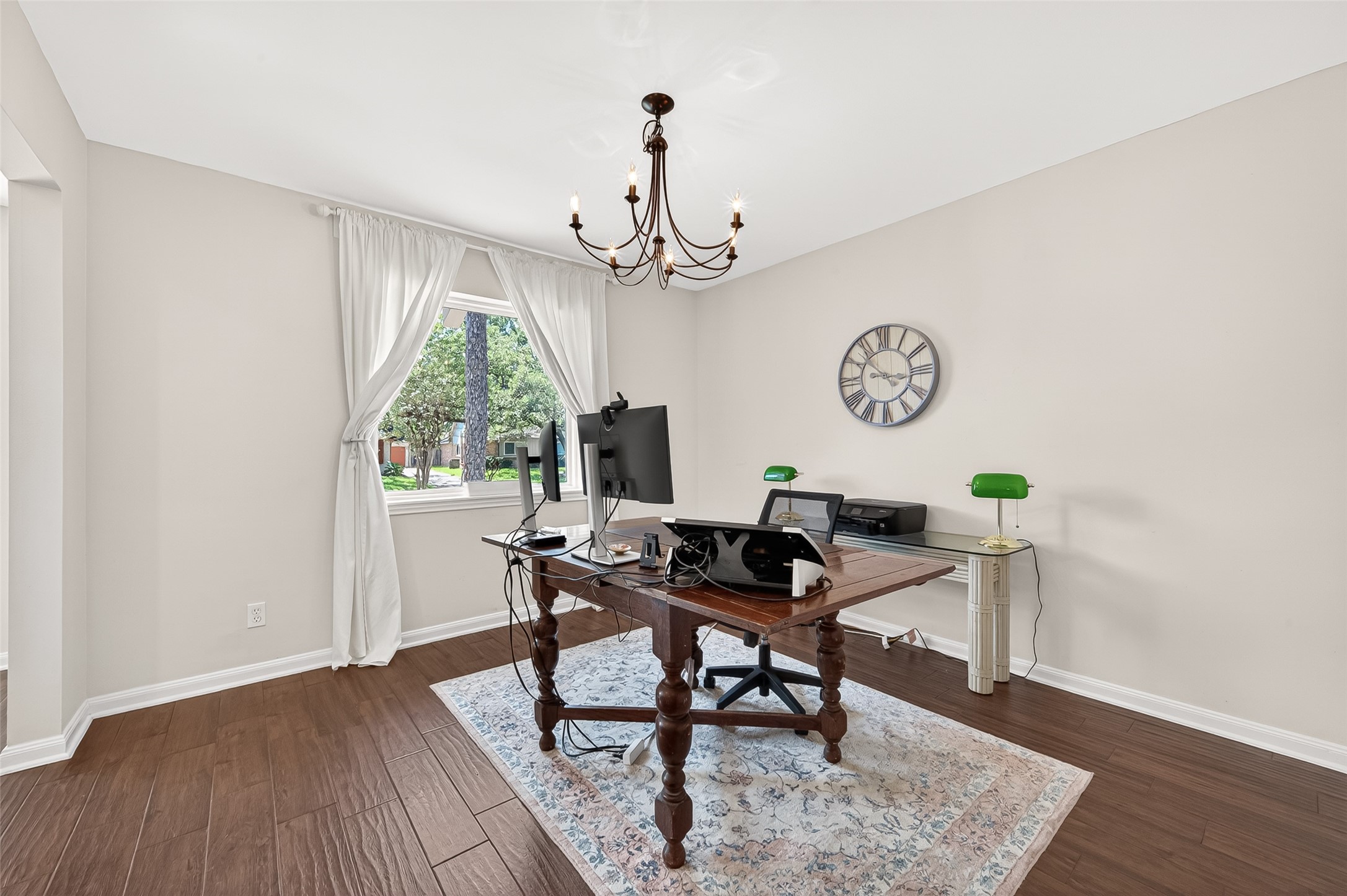 2610 Teague Road Houston, TX 77080 - Photo 14 of 49 This room is currently being used as an office but is a great flex space for a playroom or even to relocate the dining room. Large window and classic chandelier.