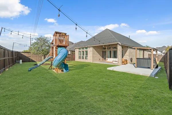 a view of a house with a park