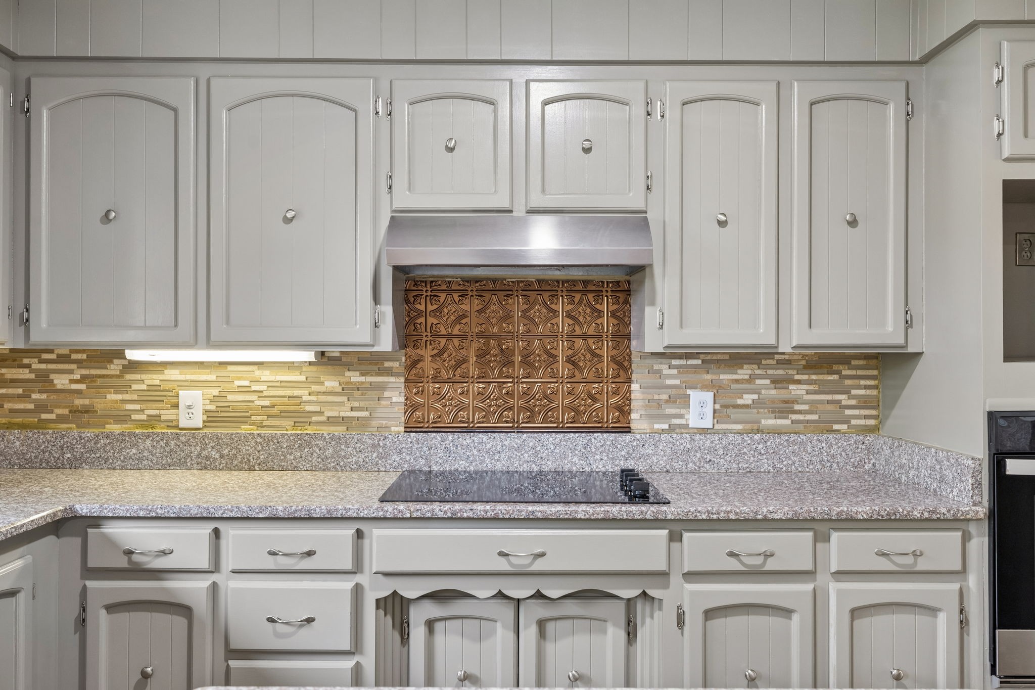1397 East Blue Creek Road Waverly, TN 37185 - Photo 22 of 93 a view of white kitchen with granite countertop white cabinets and a wooden floor