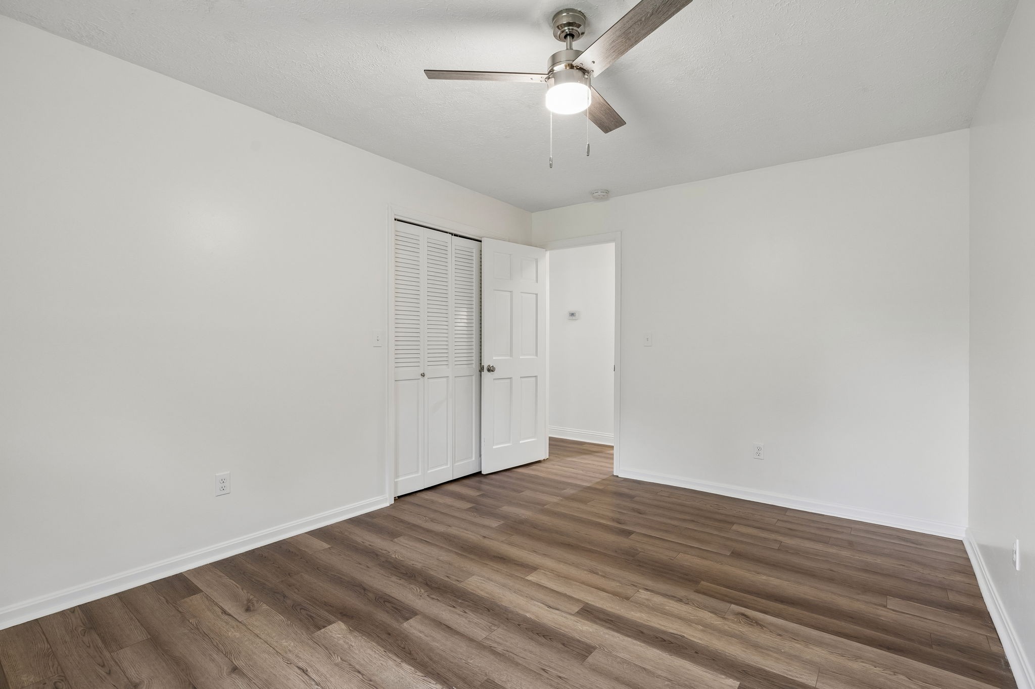 1397 East Blue Creek Road Waverly, TN 37185 - Photo 29 of 93 wooden floor in an empty room