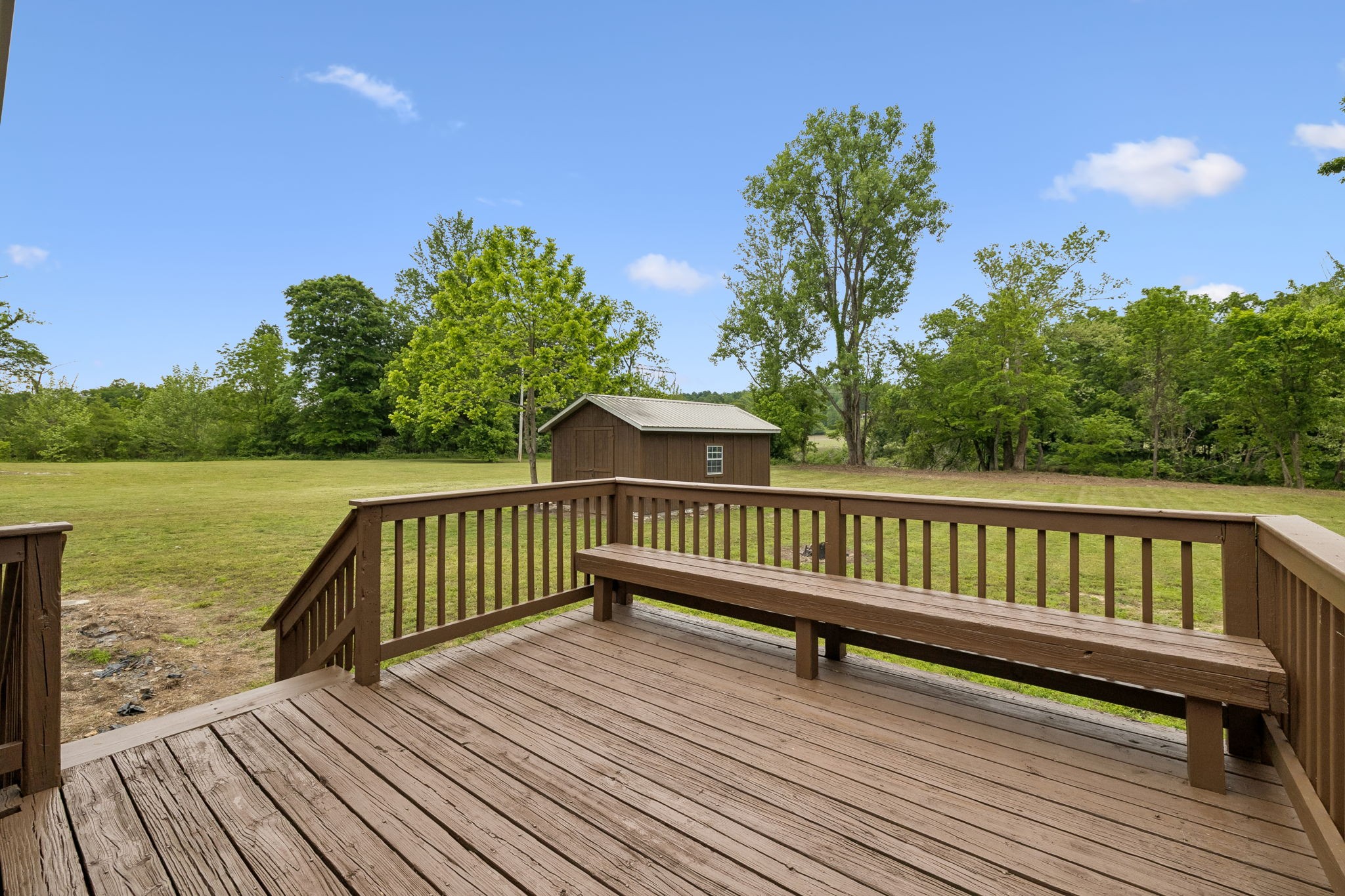 1397 East Blue Creek Road Waverly, TN 37185 - Photo 48 of 93 a view of balcony with wooden floor and lake view
