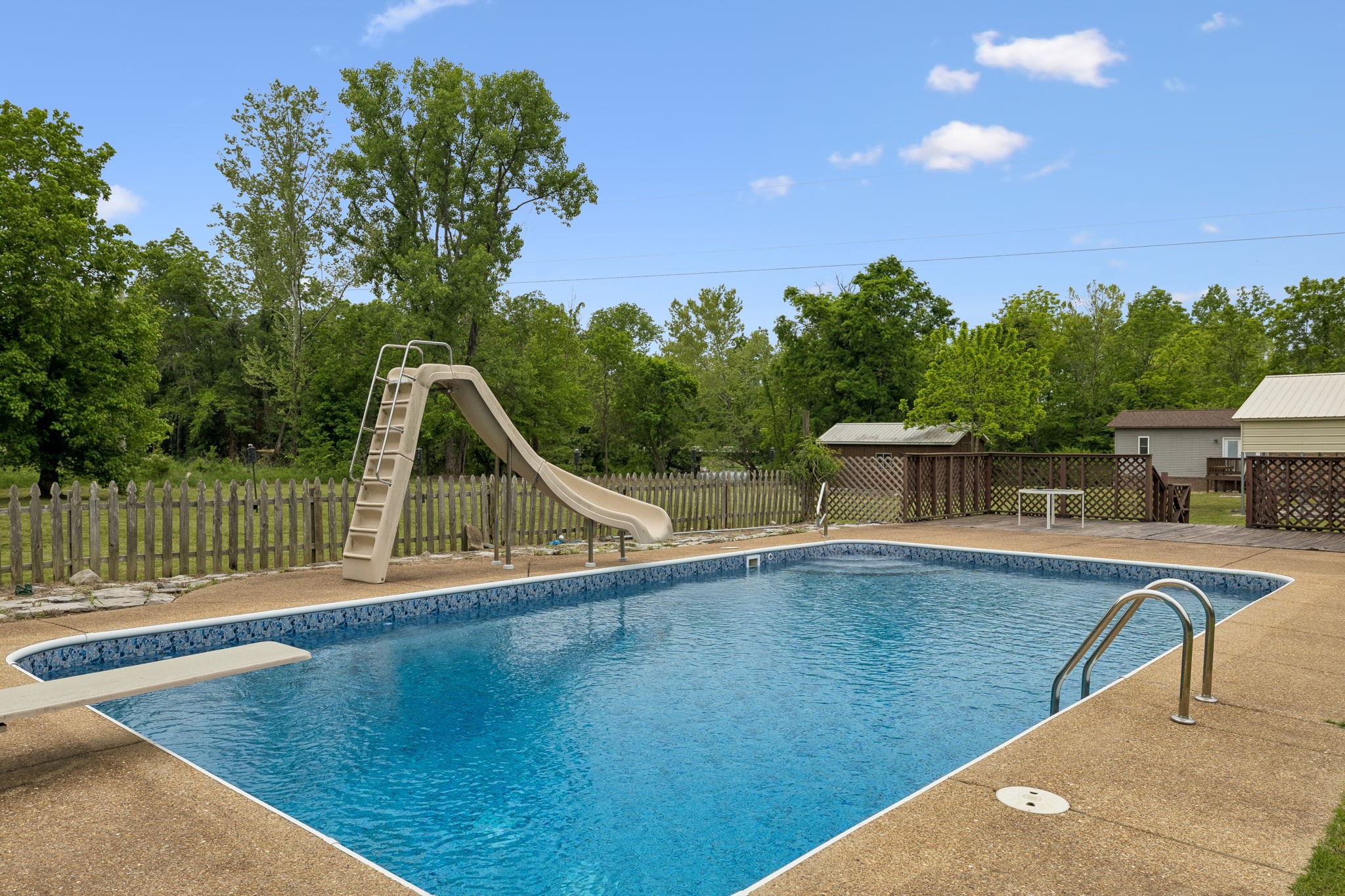 1397 East Blue Creek Road Waverly, TN 37185 - Photo 62 of 93 a view of a swimming pool with a patio and a yard