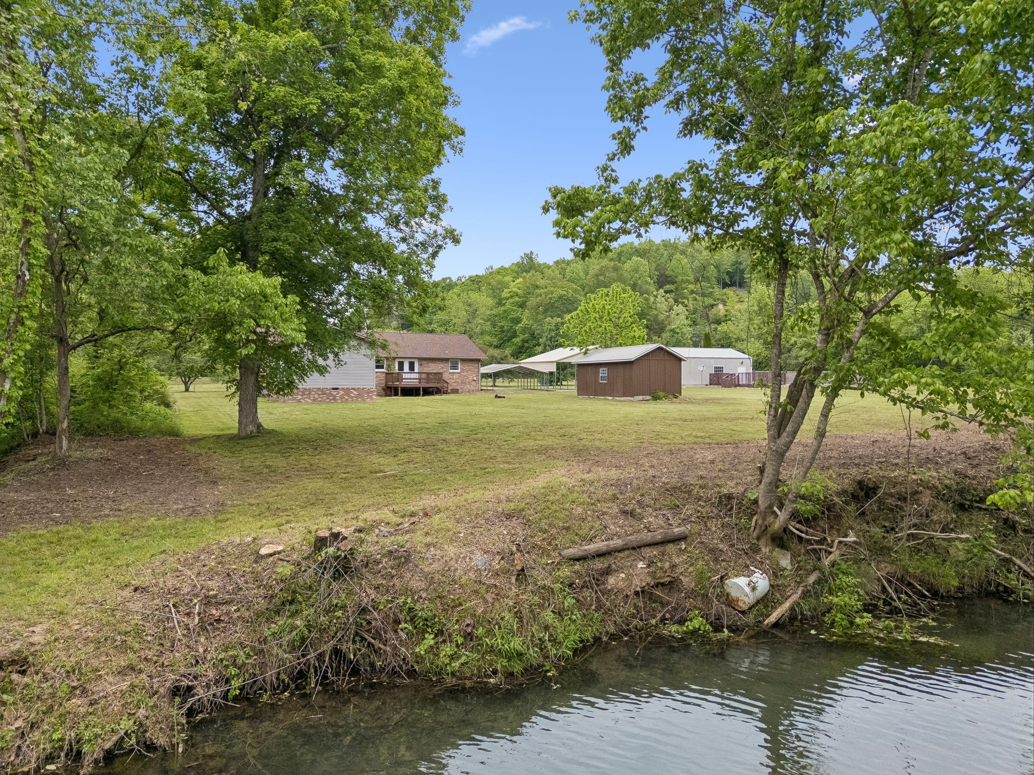 1397 East Blue Creek Road Waverly, TN 37185 - Photo 68 of 93 a view of a yard with an outdoor space