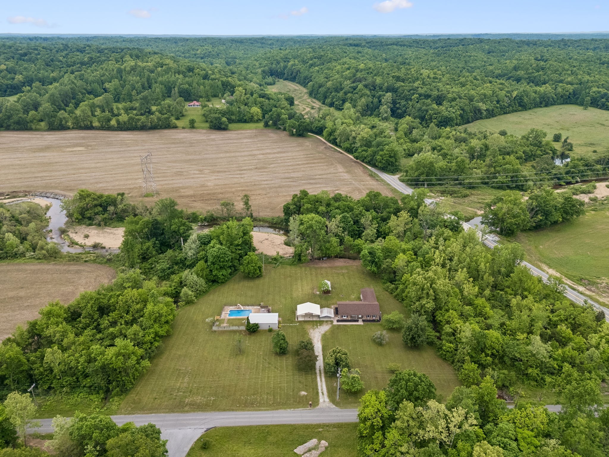 1397 East Blue Creek Road Waverly, TN 37185 - Photo 73 of 93 an aerial view of a house with a yard