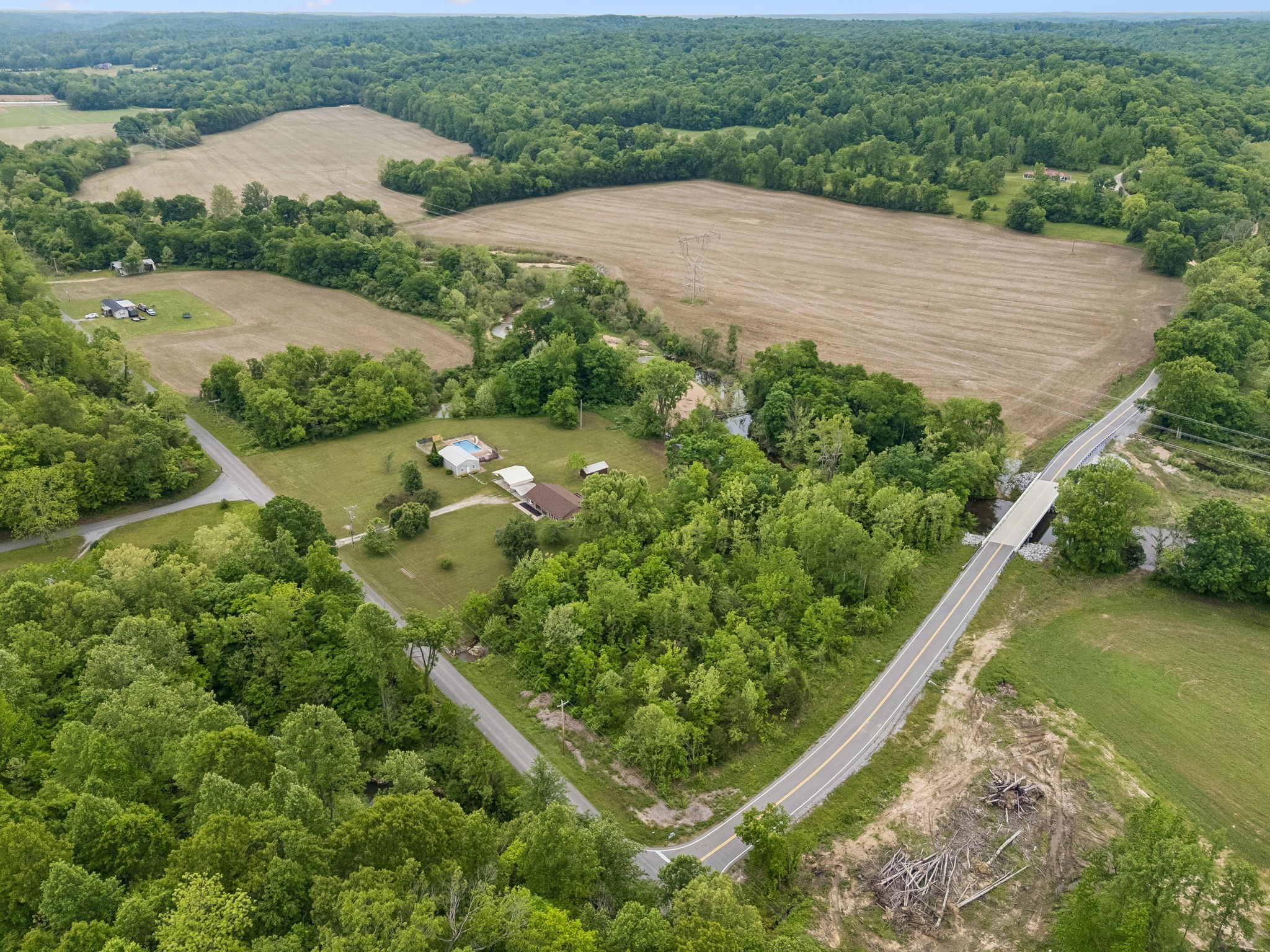 1397 East Blue Creek Road Waverly, TN 37185 - Photo 75 of 93 an aerial view of a house with a yard and lake view