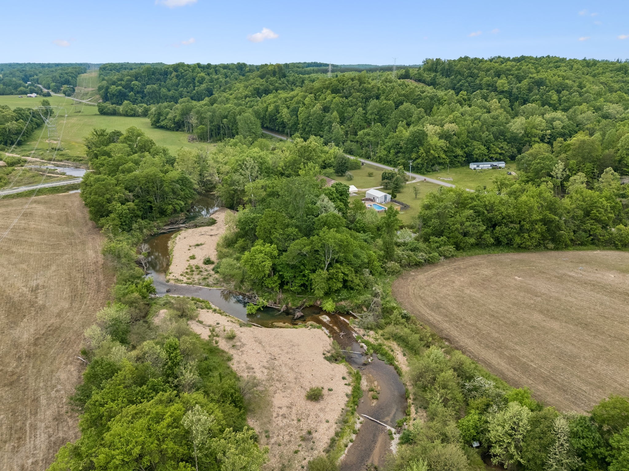 1397 East Blue Creek Road Waverly, TN 37185 - Photo 78 of 93 an aerial view of residential house with outdoor space and trees all around