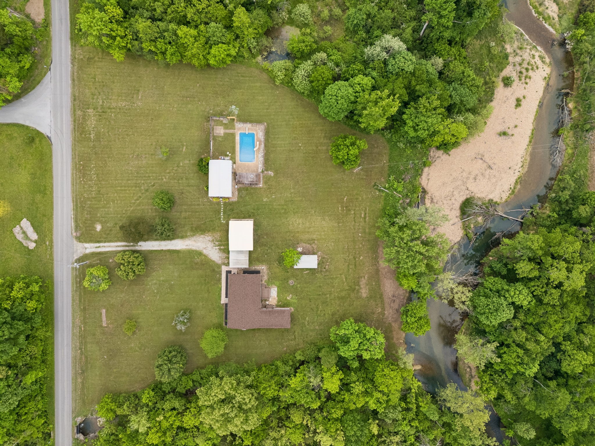 1397 East Blue Creek Road Waverly, TN 37185 - Photo 80 of 93 an aerial view of a house with a yard