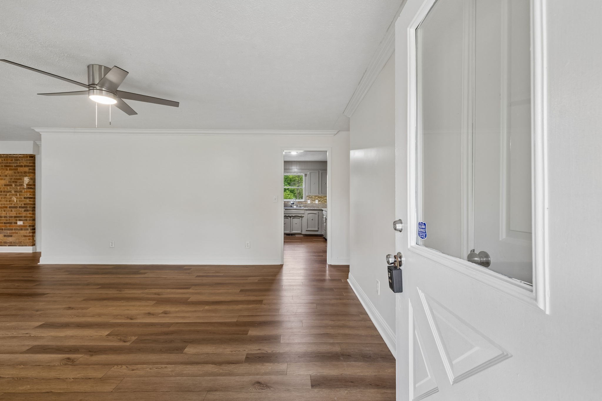 1397 East Blue Creek Road Waverly, TN 37185 - Photo 8 of 93 a view of a hallway with wooden floor and staircase