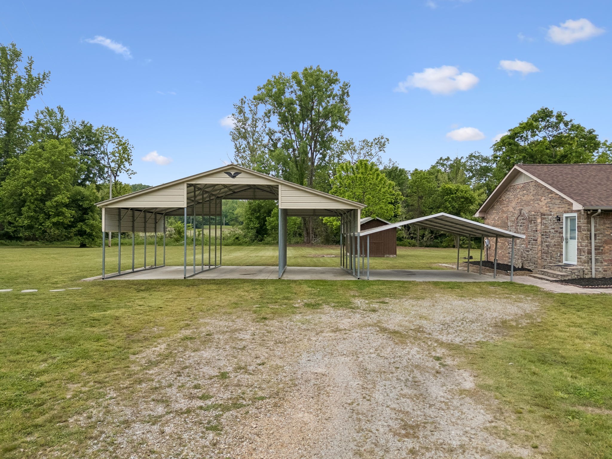 1397 East Blue Creek Road Waverly, TN 37185 - Photo 89 of 93 a front view of a house with a yard
