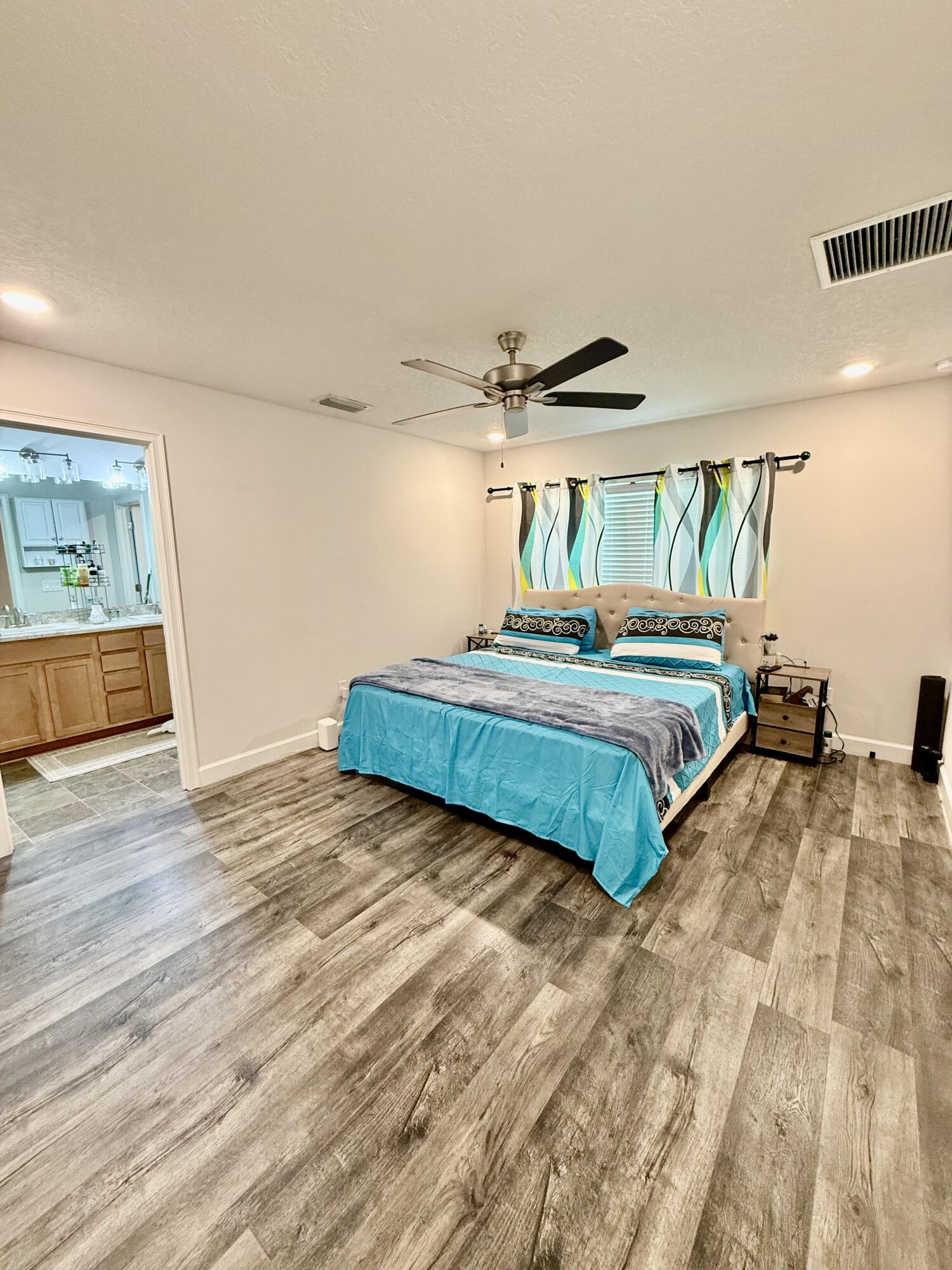 4480 Southwest Jaunt Road Port St. Lucie, FL 34953 - Photo 19 of 31 Main Bedroom