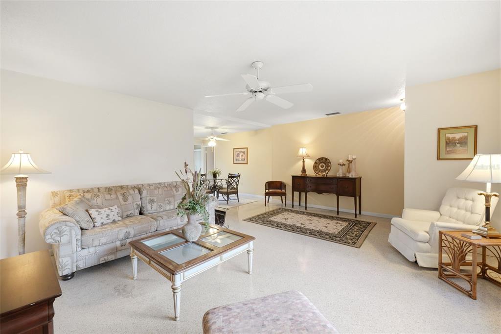 1830 South Mandarin Terrace Inverness, FL 34450 - Photo 40 of 47 a living room with furniture and a table