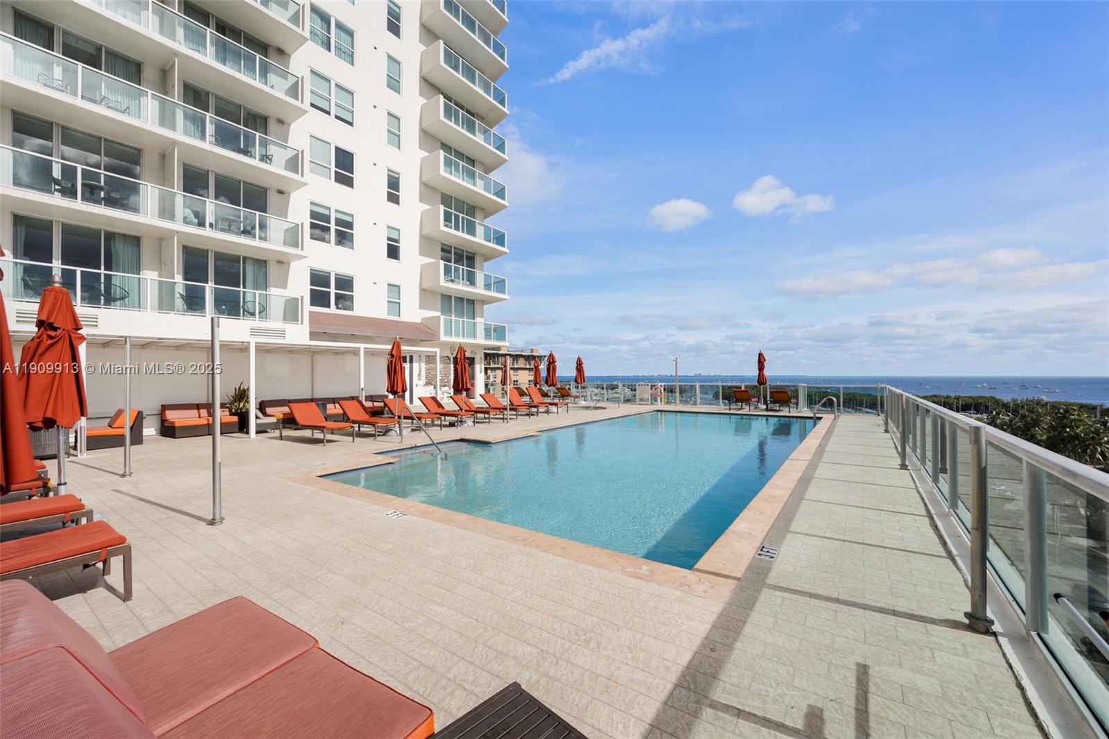 2889 McFarlane Road, Unit 1512 Coconut Grove, FL 33133 - Photo 25 of 25 a view of swimming pool with outdoor seating and city view