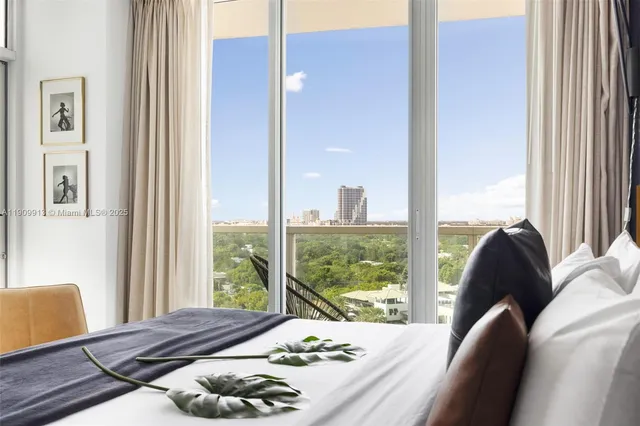 a bedroom with a bed and tv