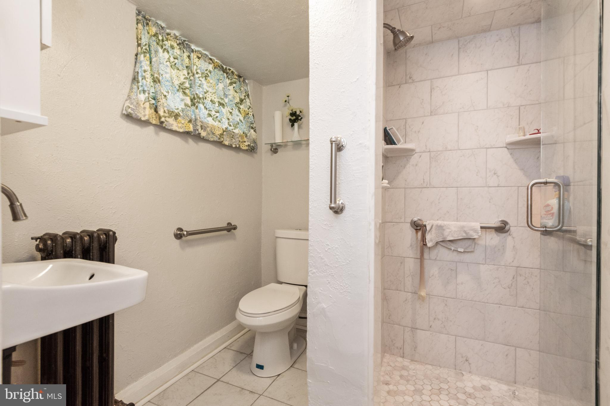 1523 Sheffield Road Baltimore, MD 21218 - Photo 16 of 43 Full bathroom in basement fully updated.