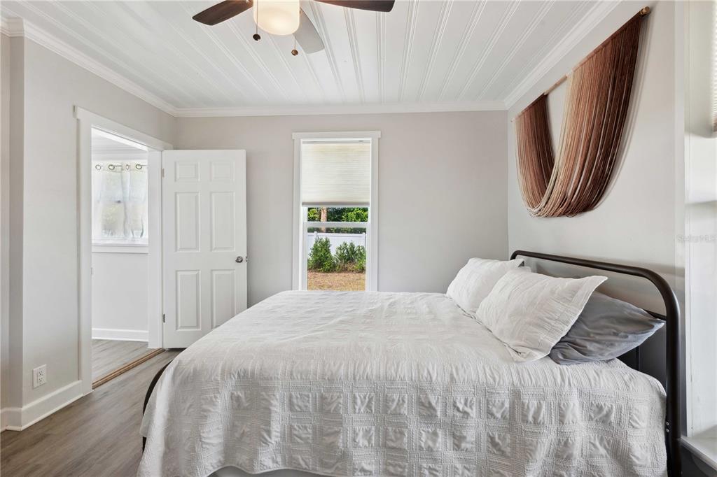 113 West Noble Avenue Bushnell, FL 33513 - Photo 17 of 56 a bedroom with a bed and a window