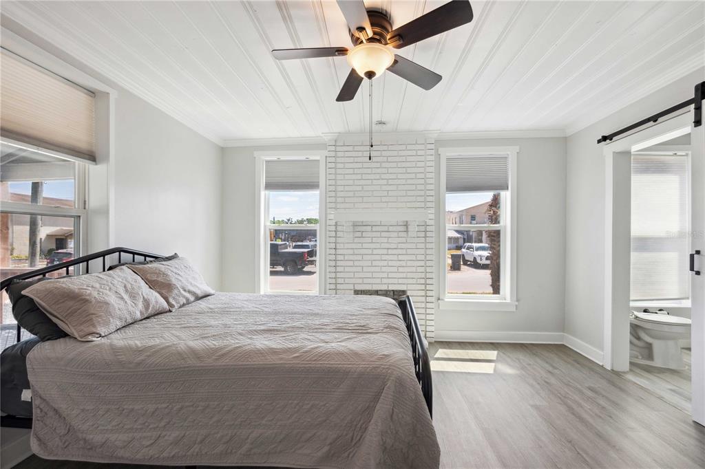 113 West Noble Avenue Bushnell, FL 33513 - Photo 18 of 56 a bedroom with a bed and a window