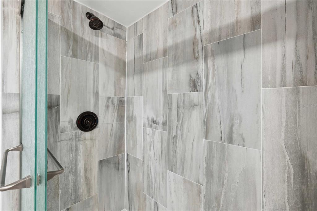 113 West Noble Avenue Bushnell, FL 33513 - Photo 30 of 56 a bathroom with a shower