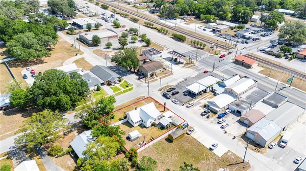 an aerial view of residential house with outdoor space