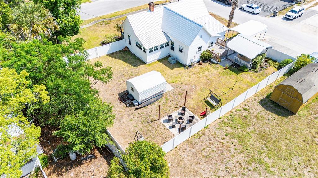 113 West Noble Avenue Bushnell, FL 33513 - Photo 55 of 56 an aerial view of a house with swimming pool