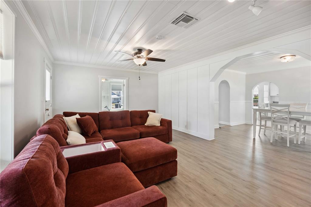 113 West Noble Avenue Bushnell, FL 33513 - Photo 7 of 56 a living room with furniture and a wooden floor