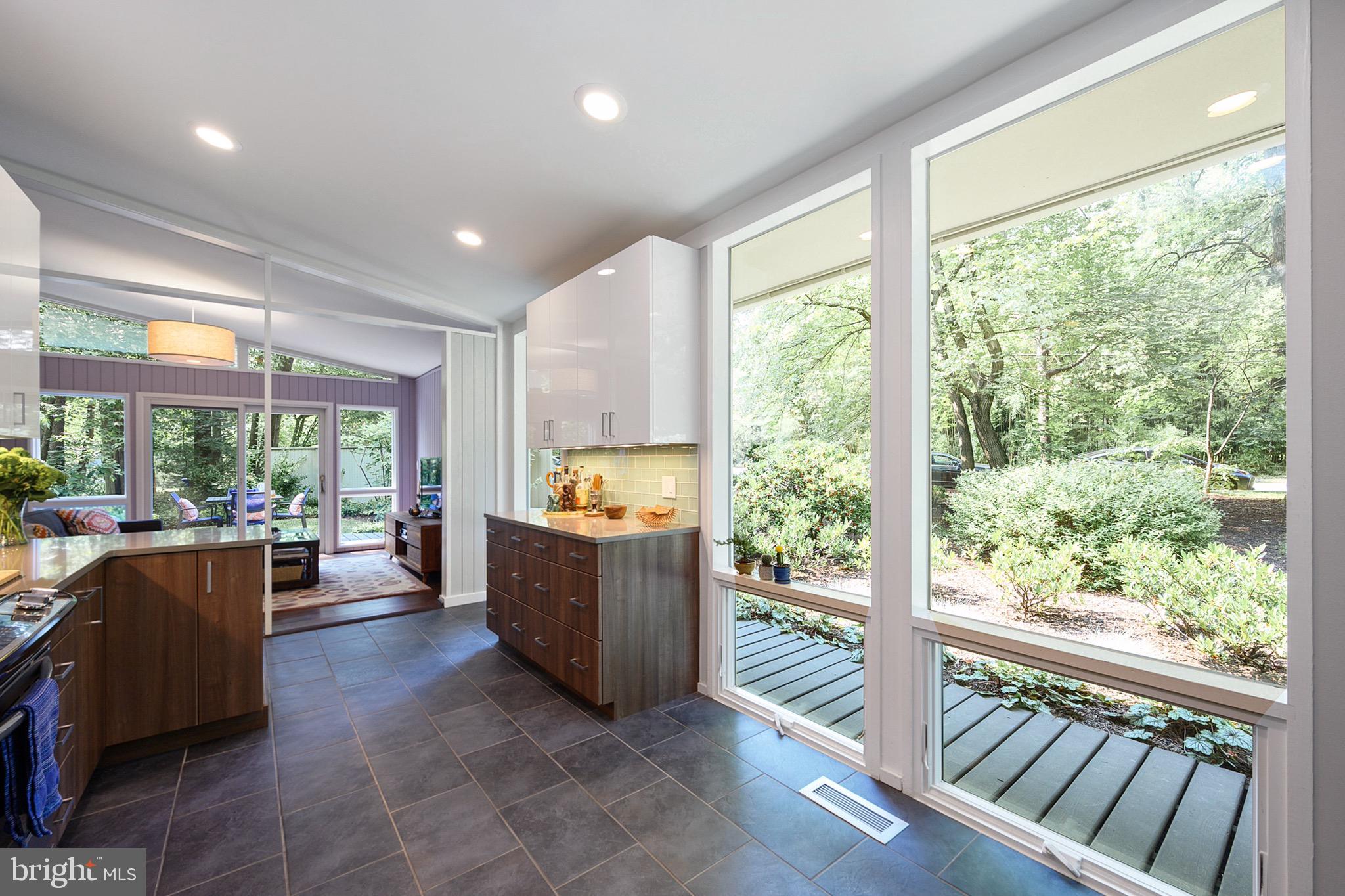 7708 Elba Road Alexandria, VA 22306 - Photo 8 of 50 Light-filled kitchen with wall of windows