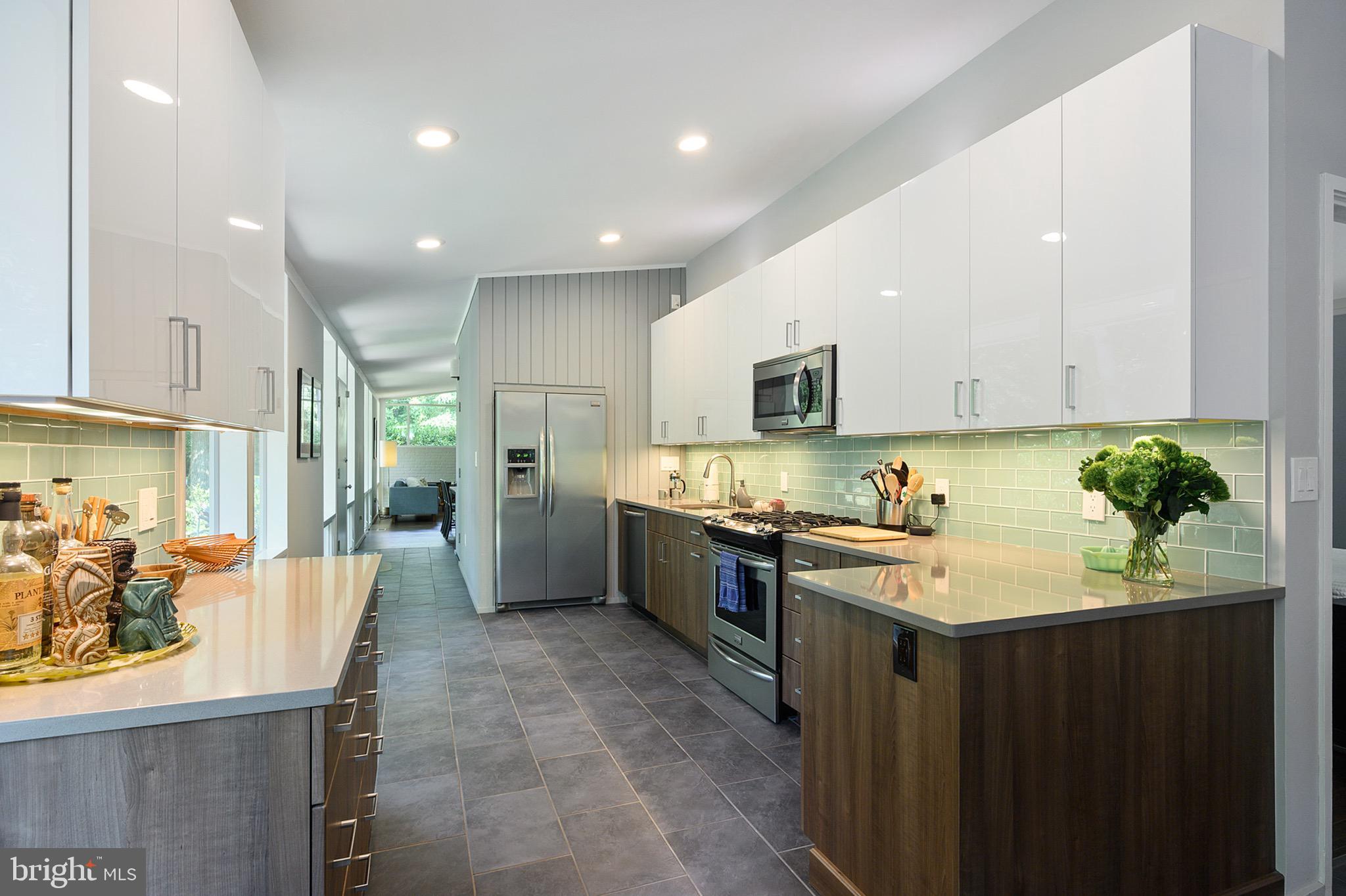 7708 Elba Road Alexandria, VA 22306 - Photo 9 of 50 Open kitchen with lots of cabinet storage