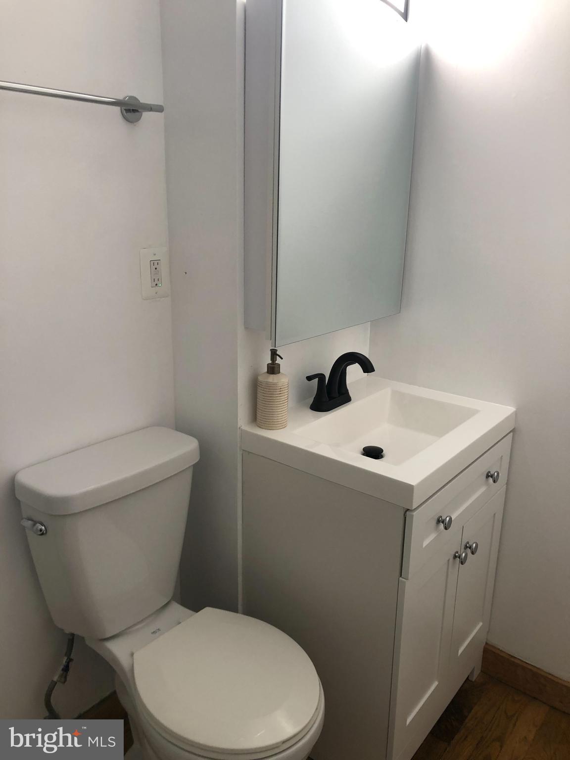 1615 Q Street Northwest, Unit 406 Washington, DC 20009 - Photo 5 of 21 New Tile, Vanity, Plumbing
