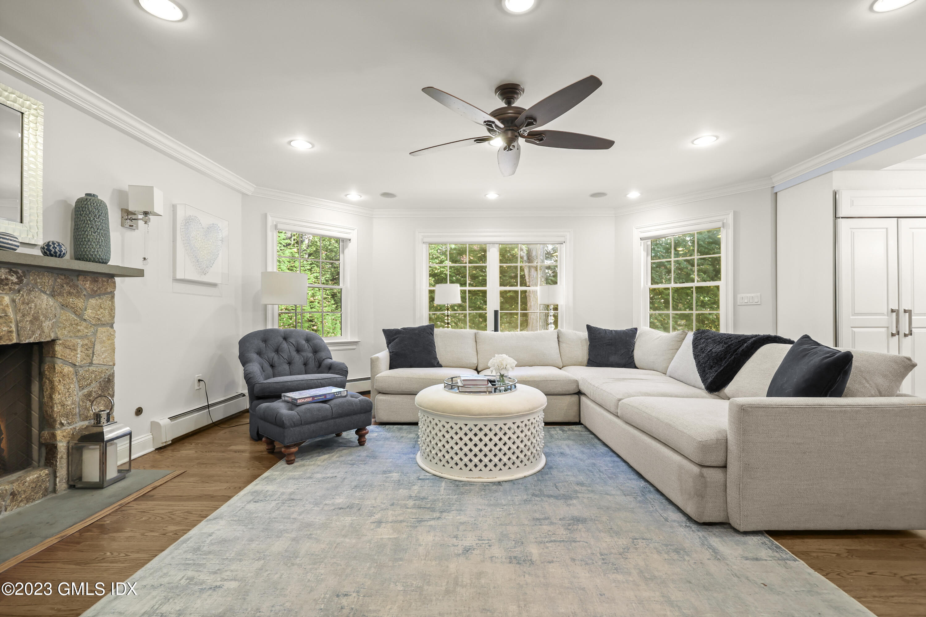 14 Rainbow Drive Riverside, CT 06878 - Photo 13 of 29 a living room with furniture and a large window