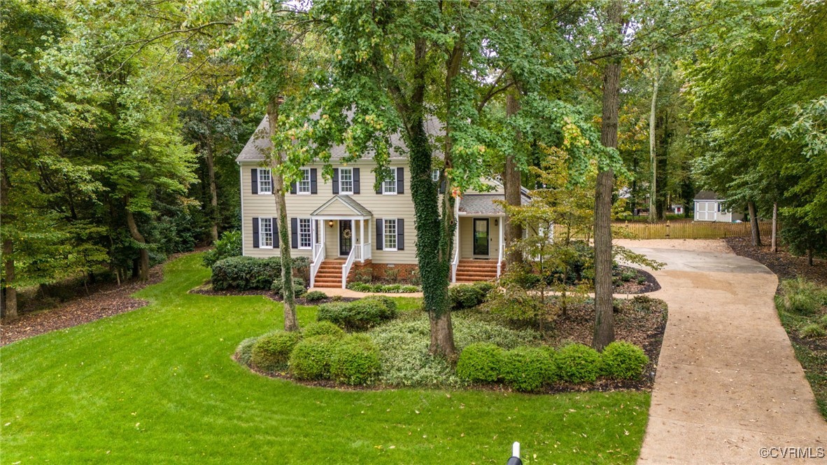 10219 Sioux Road Richmond, VA 23235 - Photo 6 of 48 Colonial-style house with a front lawn