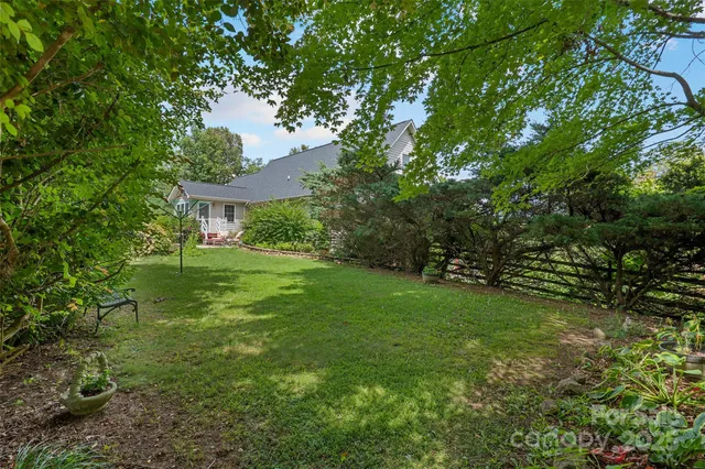 a view of a house with a big yard
