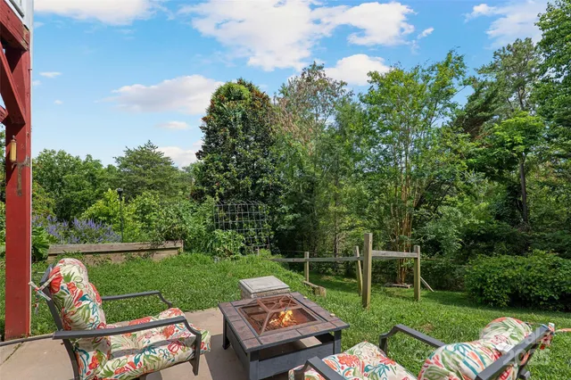 a view of backyard with green space