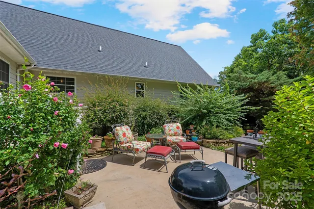 a outdoor living space with furniture and garden view