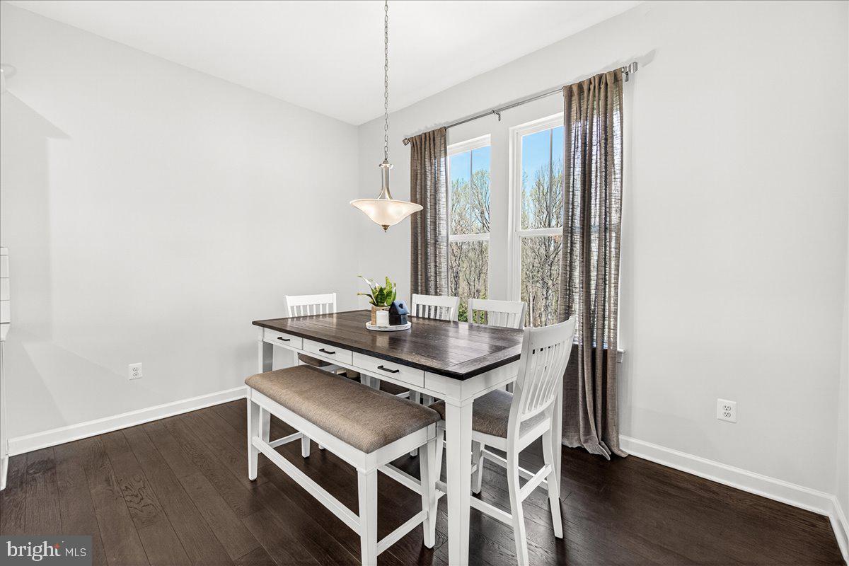 3633 Moline Court Monrovia, MD 21770 - Photo 32 of 82 a dining room with furniture and wooden floor