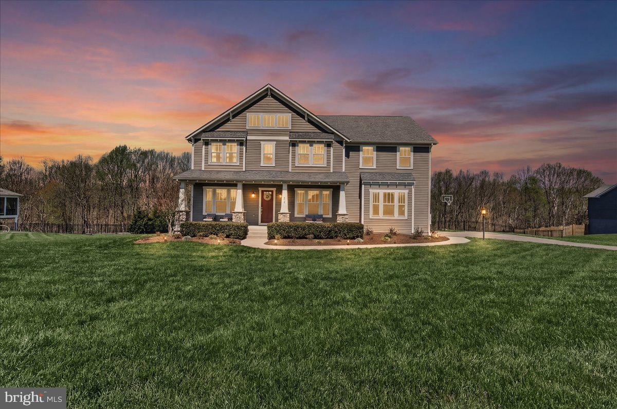 3633 Moline Court Monrovia, MD 21770 - Photo 4 of 82 a front view of a house with a yard