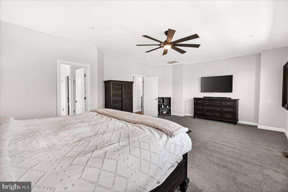 3633 Moline Court Monrovia, MD 21770 - Photo 46 of 82 a bedroom with a bed and a flat screen tv