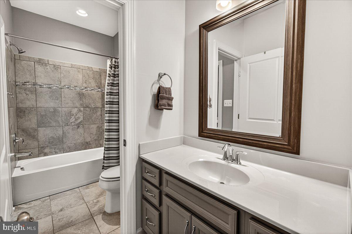 3633 Moline Court Monrovia, MD 21770 - Photo 53 of 82 a bathroom with a sink and a mirror