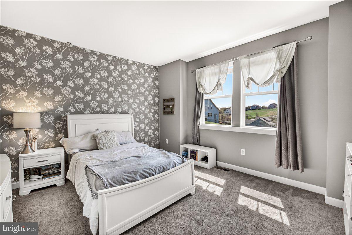 3633 Moline Court Monrovia, MD 21770 - Photo 55 of 82 a bedroom with a large bed and a large window