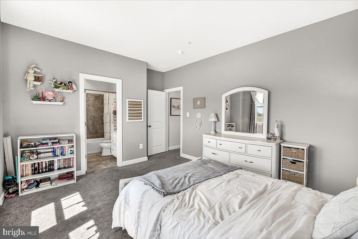 3633 Moline Court Monrovia, MD 21770 - Photo 56 of 82 a bedroom with a bed and a dresser