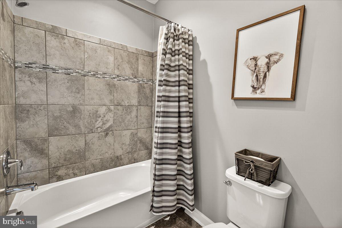3633 Moline Court Monrovia, MD 21770 - Photo 57 of 82 a bathroom with a toilet a sink and bathtub