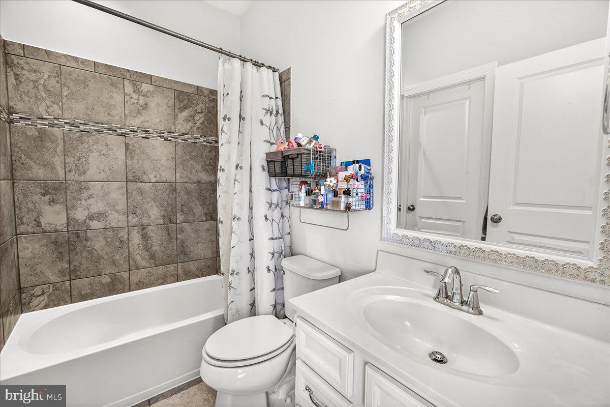 3633 Moline Court Monrovia, MD 21770 - Photo 58 of 82 a bathroom with a sink toilet and shower