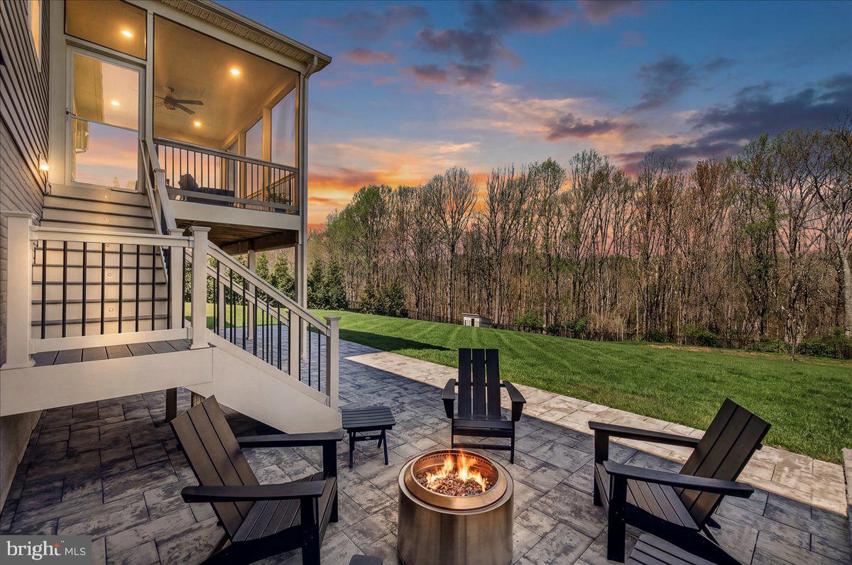 3633 Moline Court Monrovia, MD 21770 - Photo 75 of 82 a view of a patio with a table chairs and a yard
