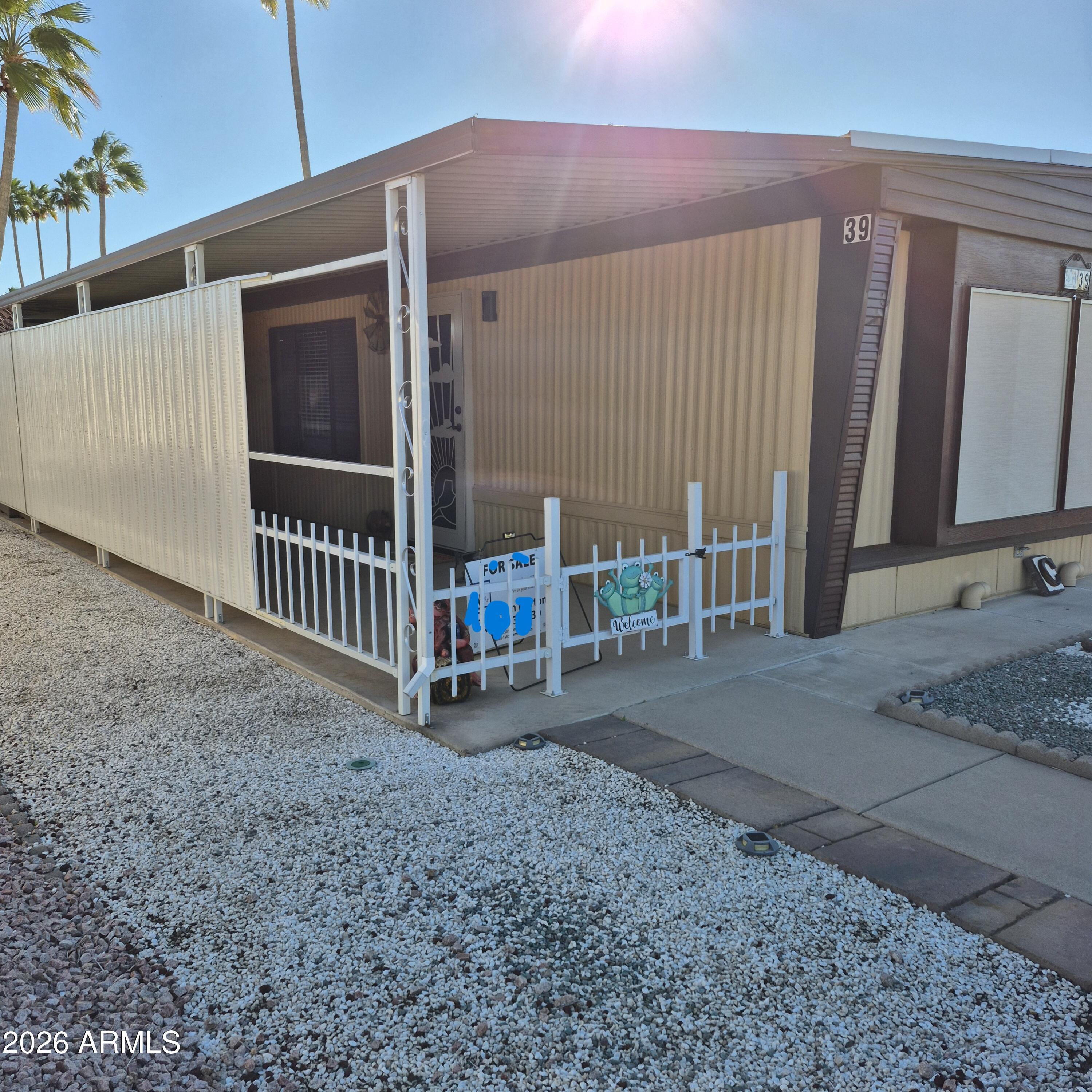 9302 East Broadway Road, Unit 39 Mesa, AZ 85208 - Photo 3 of 57 left side patio front