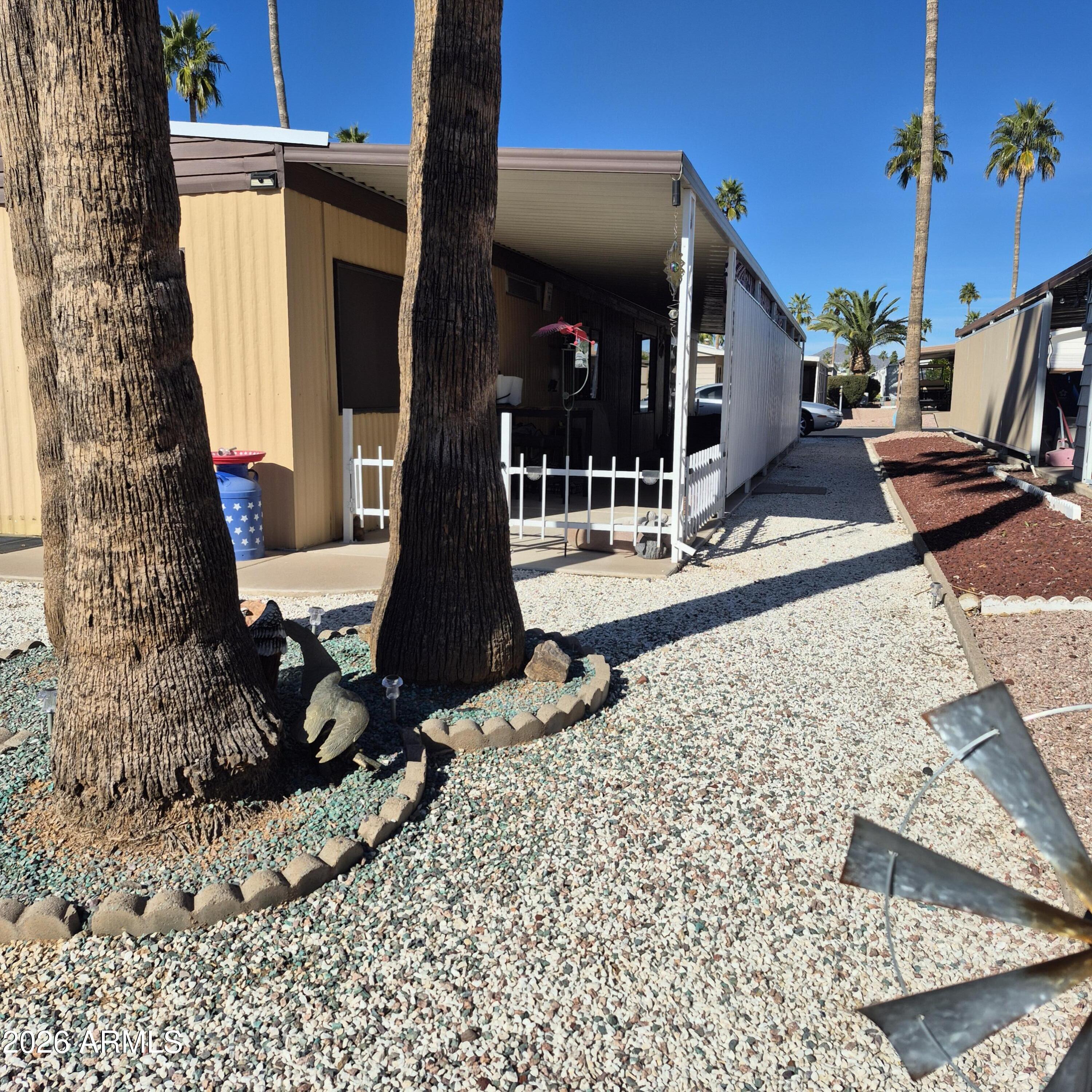 9302 East Broadway Road, Unit 39 Mesa, AZ 85208 - Photo 56 of 57 side of home 3