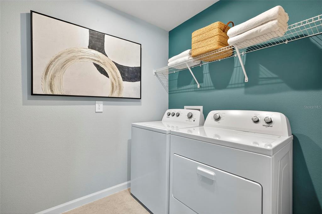 8830 Ginko Run Parrish, FL 34219 - Photo 28 of 29 a utility room with dryer and washer