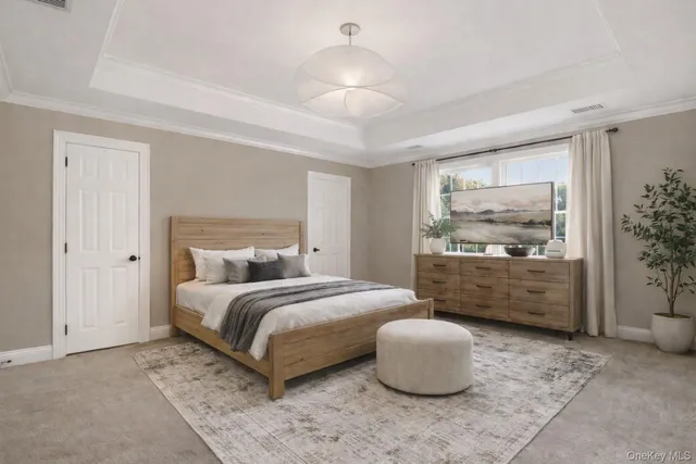 a bedroom with a bed and a couch