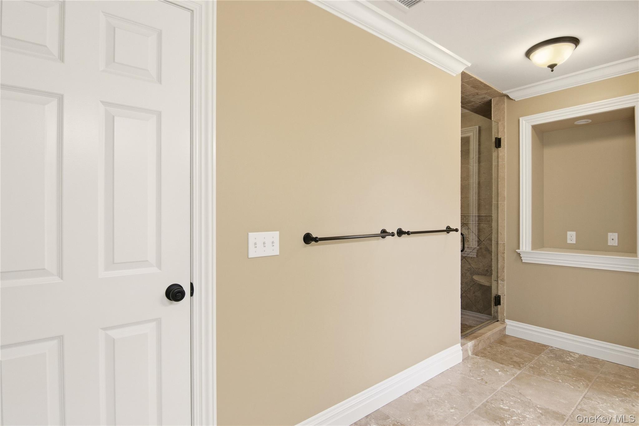 69 Old Depot Road Quogue, NY 11959 - Photo 32 of 40 Corridor with crown molding and shower