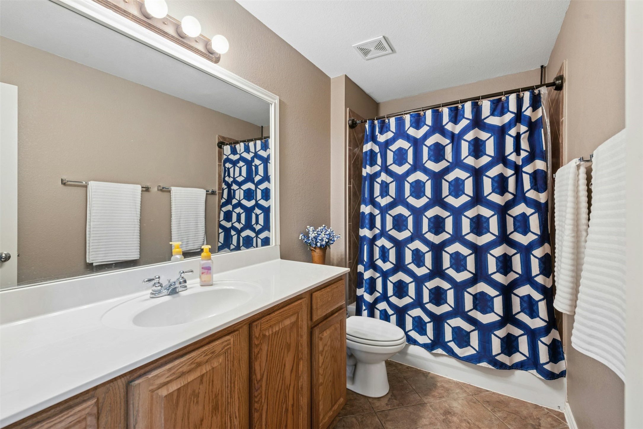 30013 Edgewood Drive Georgetown, TX 78628 - Photo 27 of 39 2nd Bathroom featuring a large vanity
