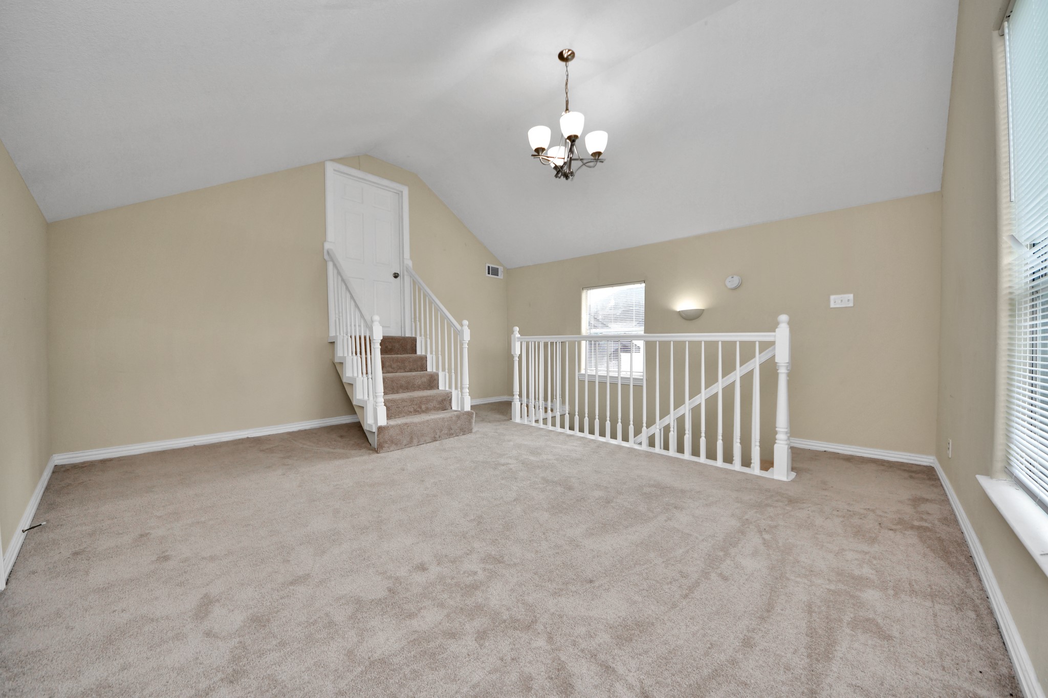 6833 Stonehaven Way Houston, TX 77085 - Photo 17 of 23 a view of a livingroom with a staircase